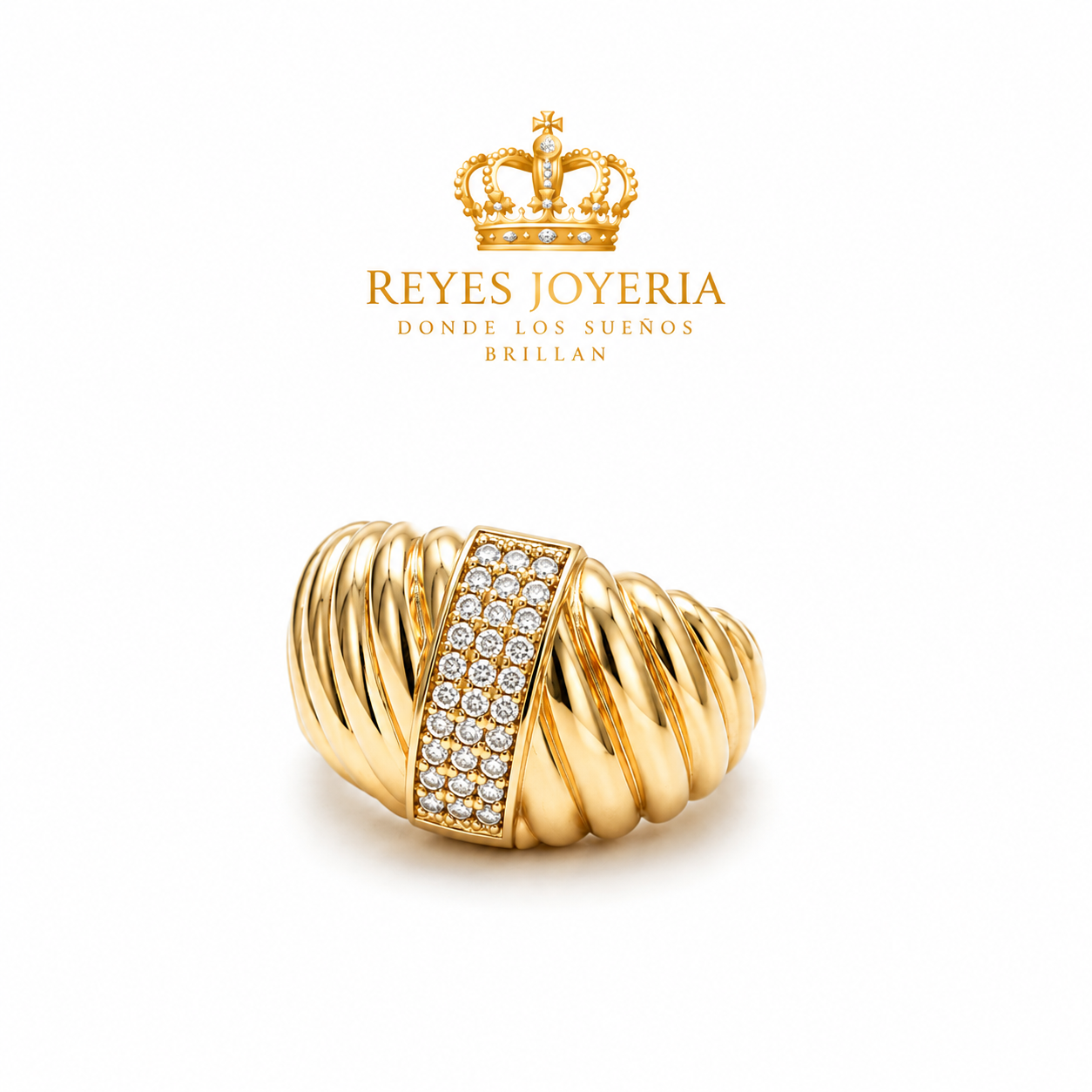 Anillo bello forma de concha con piedras 10 kt
